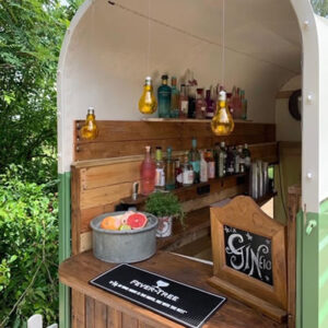 View of a gin bar in a horsebox trailer