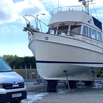 Antifoul removal - boat hull exposed for examination and repairs